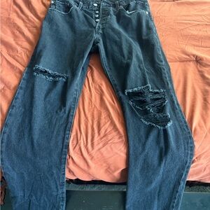 Women’s Levi’s 501 black distressed